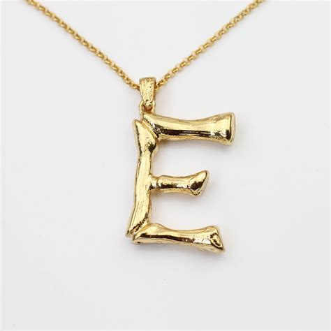 celine letter necklace uk|celine initial necklace.